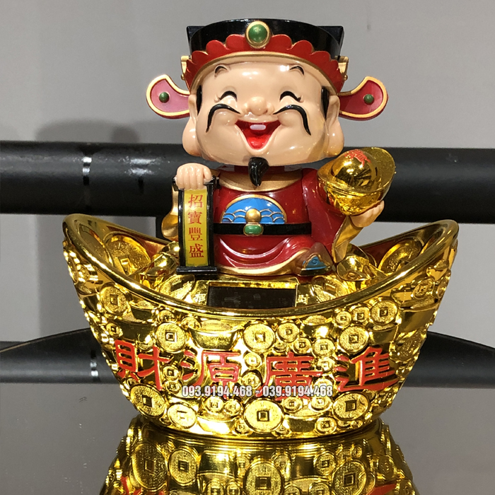 thần tài năng lượng mặt trời tự động gật đầu vẫy tay đẹp tại HCM