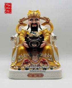 Tượng Thần Tiền áo vàng ôm hũ vàng bằng sứ