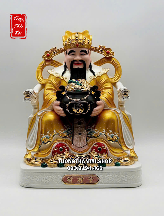 Tượng Thần Tiền áo vàng ôm hũ vàng bằng sứ